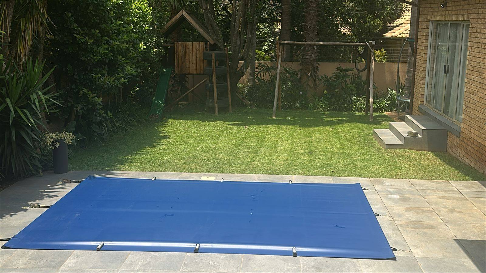 Grey PVC cover detail showing pool ladder integration